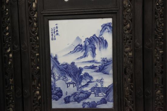 A set of four Chinese blue and white porcelain mounted wood panels, 121.5 x 38cm